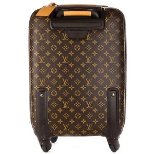 LOUIS VUITTON
Monogram Canvas Zephyr 55 Rolling Suitcase